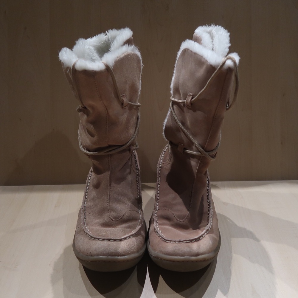 Brown suede moccasin style boots